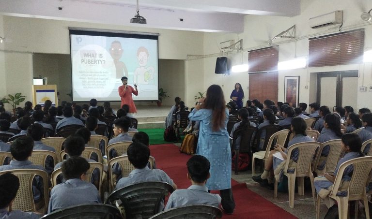 Pratisandhi volunteers conducting a workshop at a school.