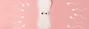 Playful image of a sanitary pad with googly eyes being surrounded by sperm.